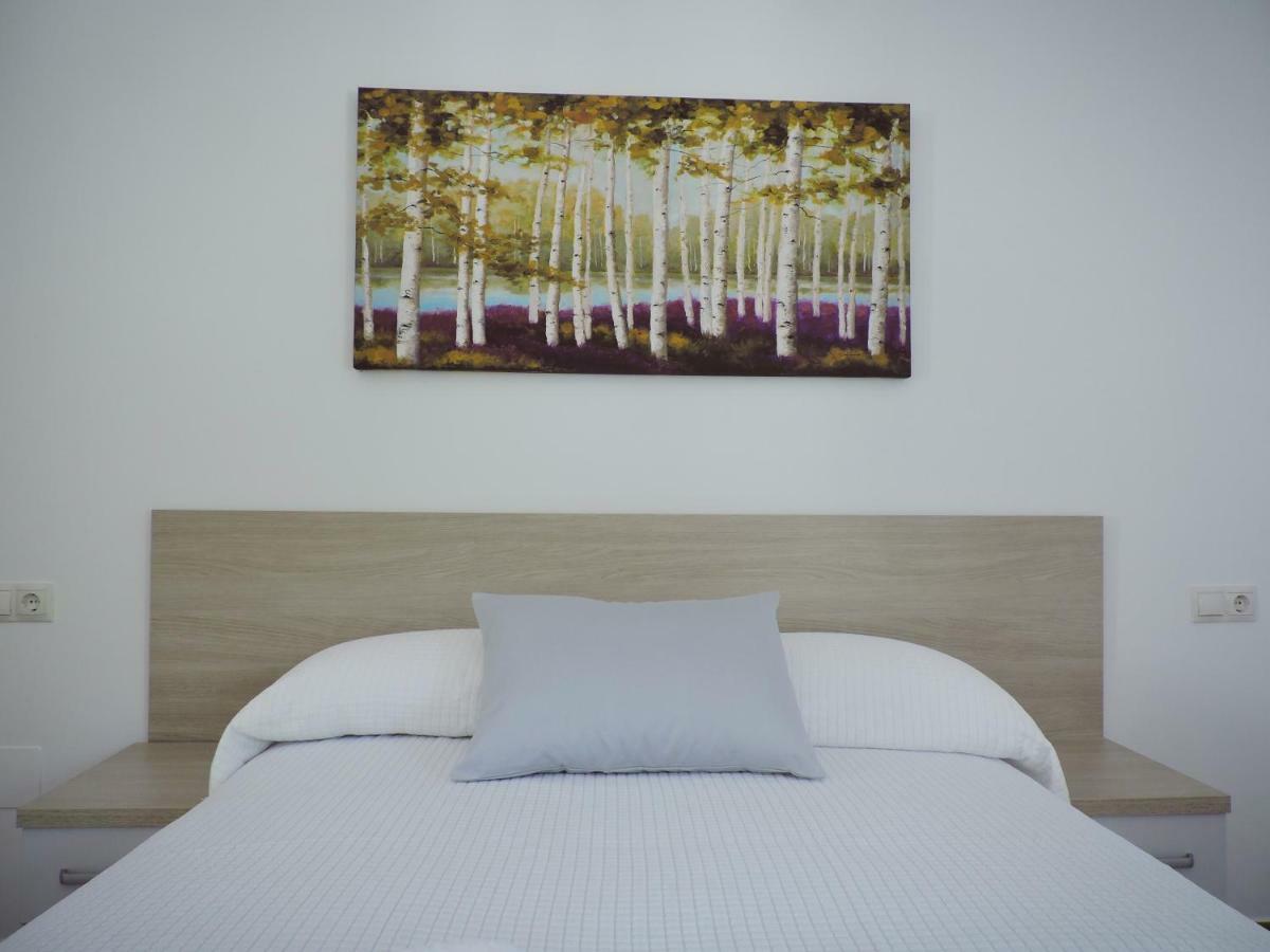 Hostal Delia Alora Esterno foto